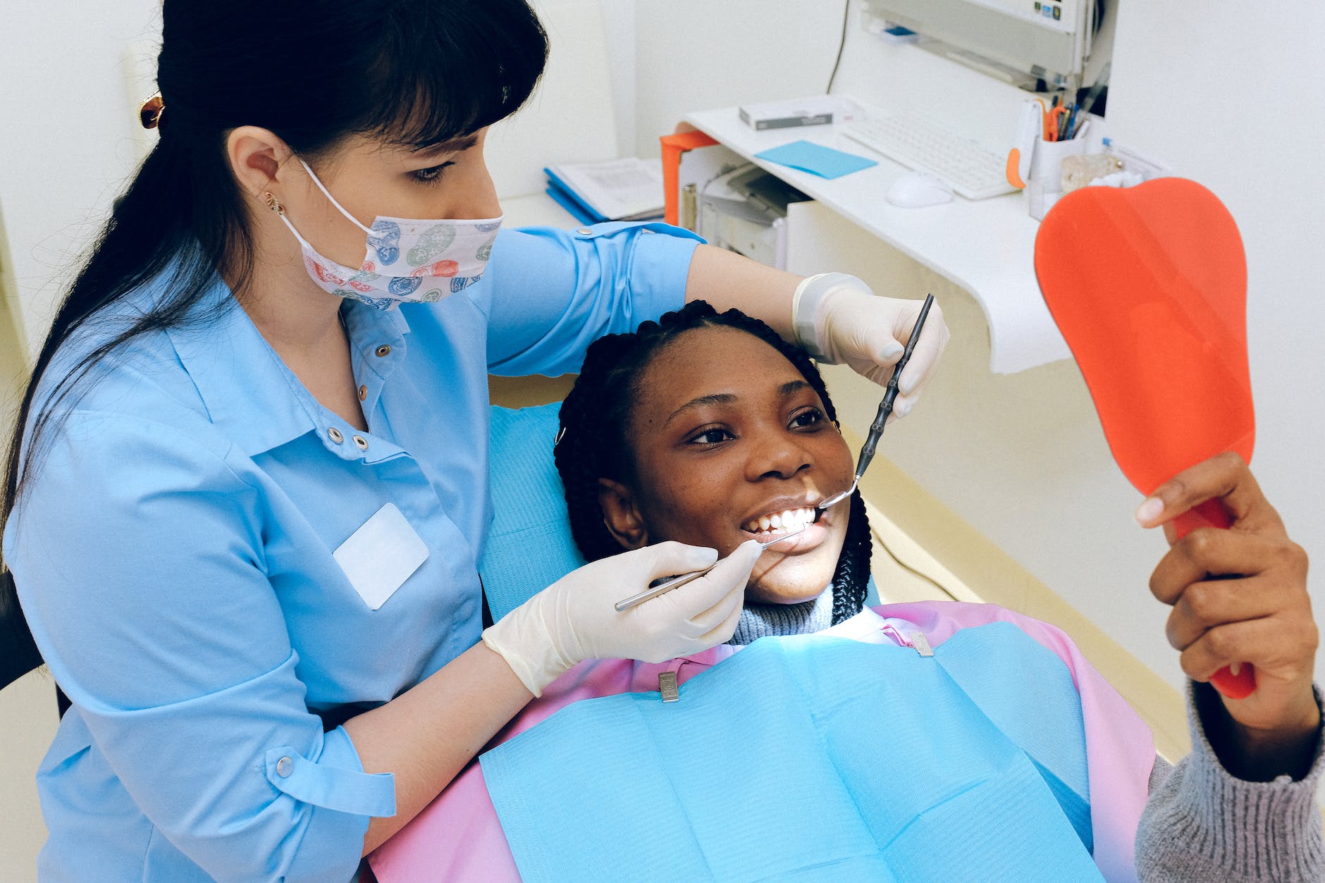 Why Do My Gums Hurt? Common Causes and Remedies 6 woman having dental check up